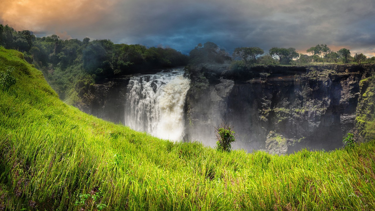 A magnificent waterfall crashing into a deep canyon.